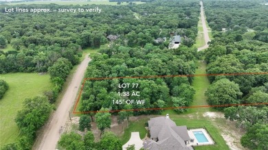 This 1.38-acre wooded lot features approximately 145 feet of - Lake Lot For Sale in Mabank, Texas