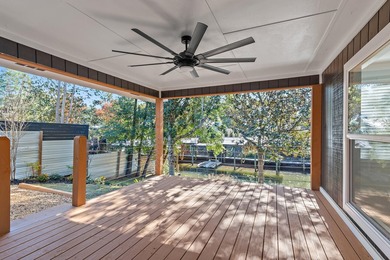 75' of canal frontage sets the stage for easy waterfront living - photo 16