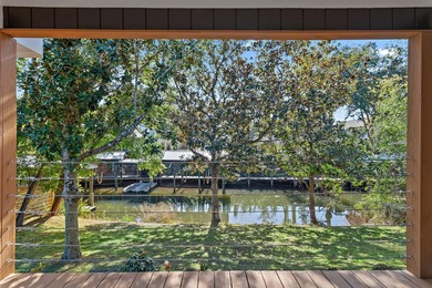 75' of canal frontage sets the stage for easy waterfront living - photo 18
