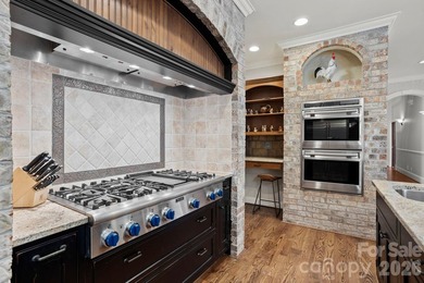 Stunning Estate Home in Prestigious Kenmure Golf Community - photo 25