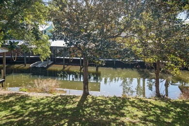75' of canal frontage sets the stage for easy waterfront living - photo 29