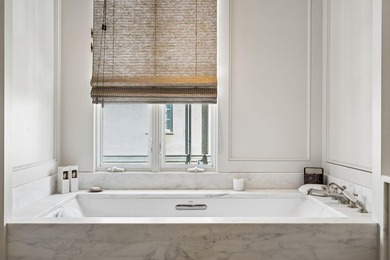 A sophisticated and luxurious townhouse-style condominium - photo 31
