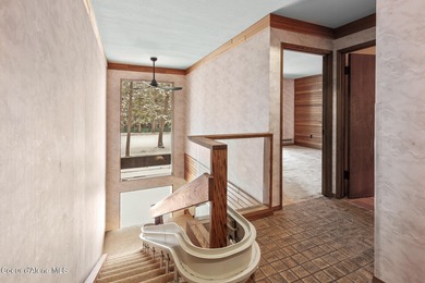 Opportunity to own a designer home situated on the 14th fairway