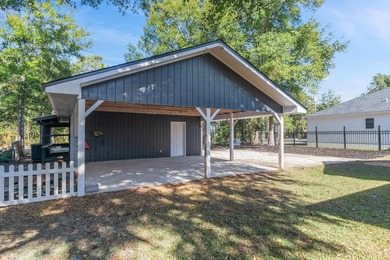 75' of canal frontage sets the stage for easy waterfront living - photo 34
