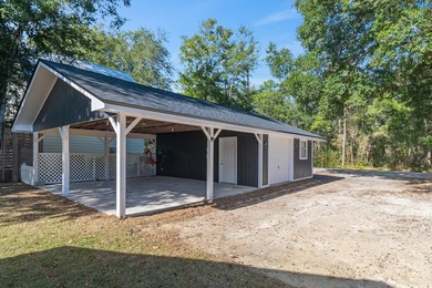 75' of canal frontage sets the stage for easy waterfront living - photo 35