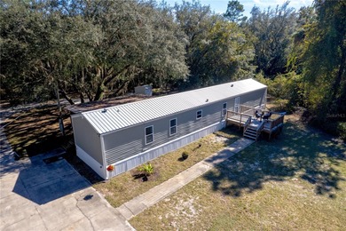 (private lake, pond, creek) Home For Sale in Satsuma Florida