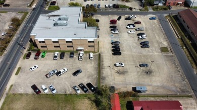 Located on a highly visible corridor just blocks from downtown