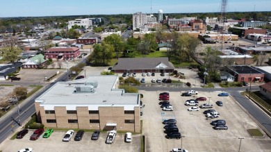 Located on a highly visible corridor just blocks from downtown