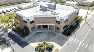 Located on a highly visible corridor just blocks from downtown