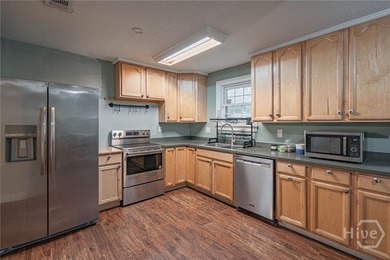 Semi-Updated interior layout creates large open area floor plan - photo 12