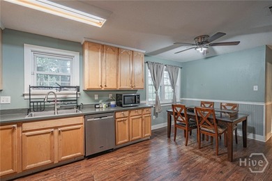Semi-Updated interior layout creates large open area floor plan - photo 14