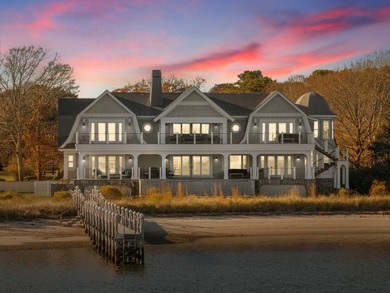 Set on 175 feet of private sandy beachfront with a 136' dock - photo 1