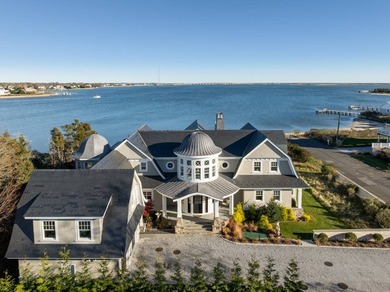 Set on 175 feet of private sandy beachfront with a 136' dock - photo 3