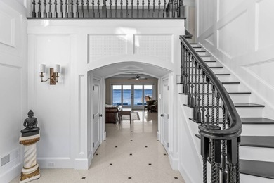 Set on 175 feet of private sandy beachfront with a 136' dock - photo 6