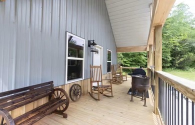 Escape to the beauty of Lake Cumberland with this charming - photo 2