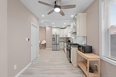 Welcome to this beautifully renovated, move-in-ready 2-family - photo 11
