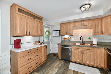Tucked away on a quiet lot that COMBINES a spacious lawn with a - photo 11