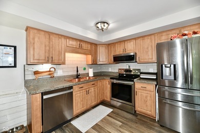 Tucked away on a quiet lot that COMBINES a spacious lawn with a - photo 13