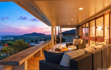 Perched high above the ocean in coveted Waialae Iki, this - photo 1