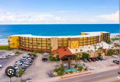 Welcome to this beautifully beachfront condotel unit, offering - photo 1