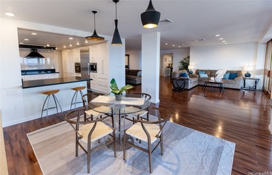 Perched high above the ocean in coveted Waialae Iki, this - photo 4