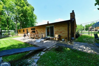Tucked away on a quiet lot that COMBINES a spacious lawn with a - photo 39