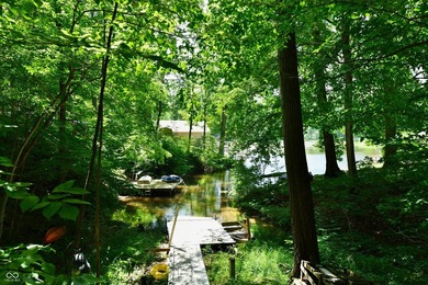Tucked away on a quiet lot that COMBINES a spacious lawn with a - photo 41