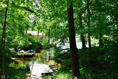 Tucked away on a quiet lot that COMBINES a spacious lawn with a - photo 42