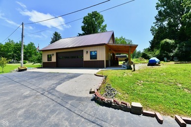 Tucked away on a quiet lot that COMBINES a spacious lawn with a - photo 49