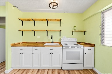Welcome to Makiki Colony, where comfort meets convenience in the - photo 3