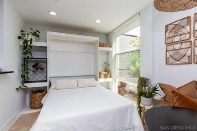 Ideally located just minutes from Petco Park and the vibrant - photo 4