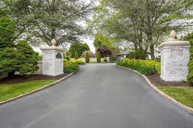 Set behind layers of mature landscaping and sculpted hedges - photo 5