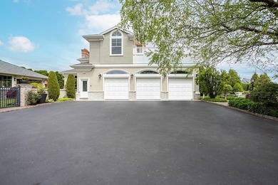 Set behind layers of mature landscaping and sculpted hedges - photo 8