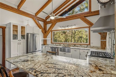 Architecturally distinctive cedar-sided post-and-beam home - photo 12