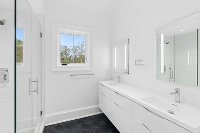 A newly built, traditional cedar-shake estate with pond and bay - photo 21