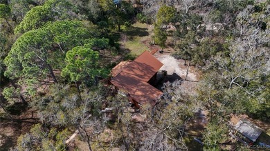 Architecturally distinctive cedar-sided post-and-beam home - photo 49