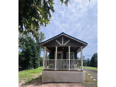 Located in the Fairmount Community, this charming tiny home - photo 2
