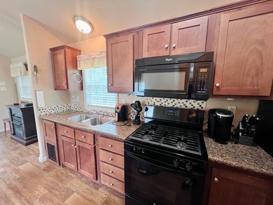 Located in the Fairmount Community, this charming tiny home - photo 8
