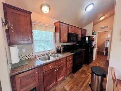 Located in the Fairmount Community, this charming tiny home - photo 9