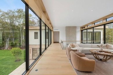 A newly built modern showpiece with sweeping bay and pond views - photo 16