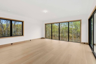 A newly built modern showpiece with sweeping bay and pond views - photo 20
