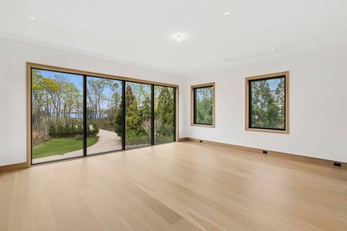 A newly built modern showpiece with sweeping bay and pond views - photo 22