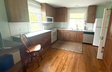 Welcome home to a spacious four bedroom, two bathroom,  modern - photo 4