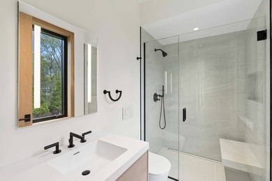 A newly built modern showpiece with sweeping bay and pond views - photo 25