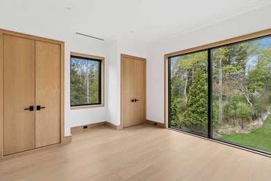 A newly built modern showpiece with sweeping bay and pond views - photo 26