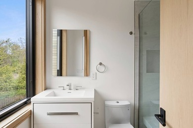 A newly built modern showpiece with sweeping bay and pond views - photo 27