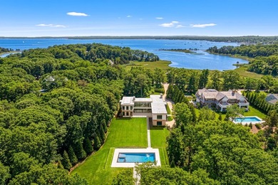 A newly built modern showpiece with sweeping bay and pond views - photo 29