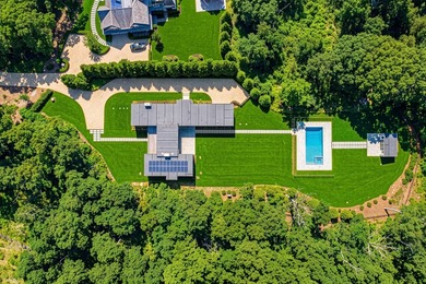 A newly built modern showpiece with sweeping bay and pond views - photo 30