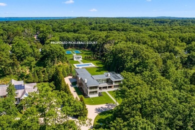 A newly built modern showpiece with sweeping bay and pond views - photo 33