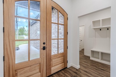 Beautiful approx. 2130 sq ft brick home featuring an open floor - photo 2